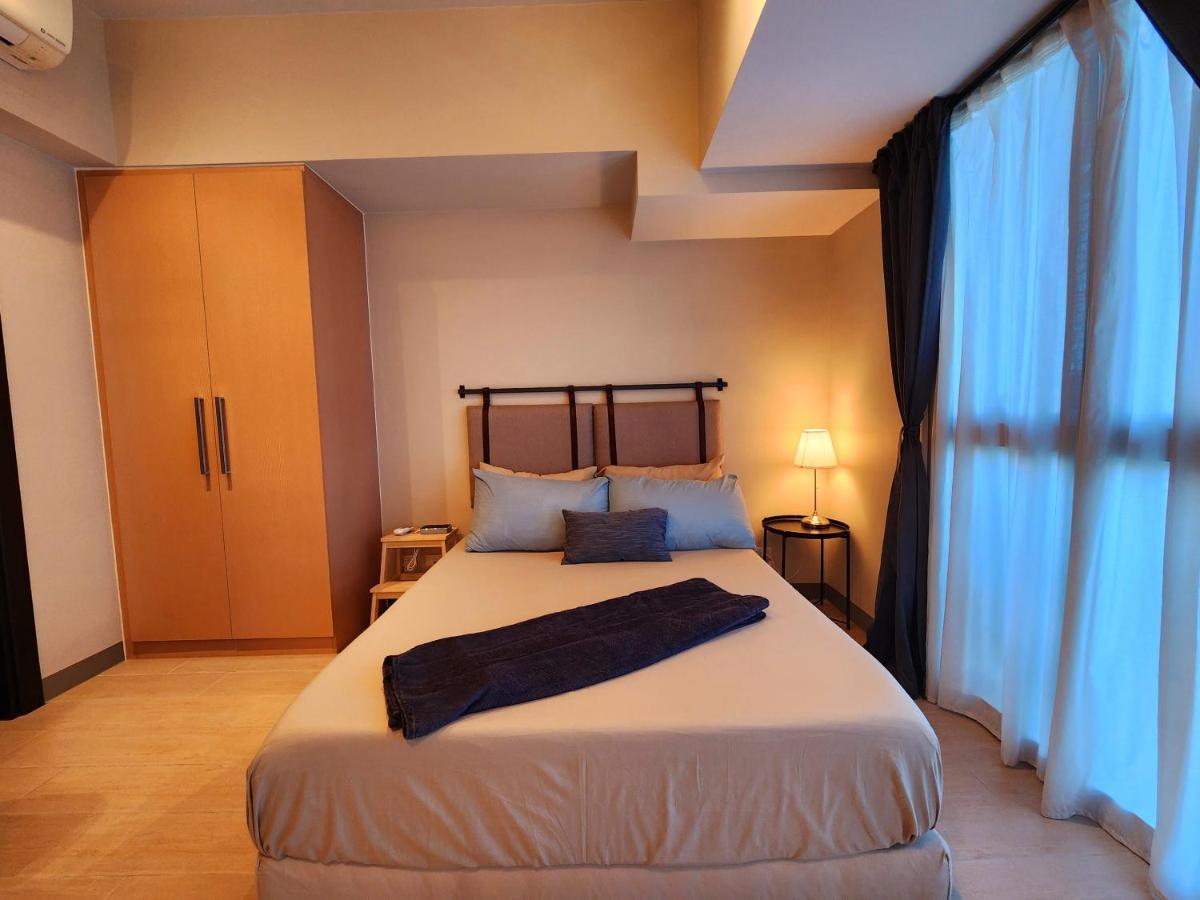 Spacious 7U Homey Unit Steps Away From Uptown Mall And Mitsukoshi Mall Free Parking With Washer Manila Exterior foto